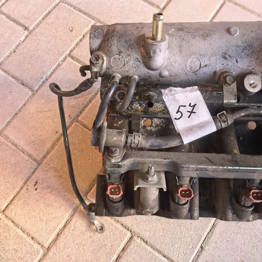 Впускной коллектор в сборе Nissan Sunny, OEM 140014M560 — фото 2