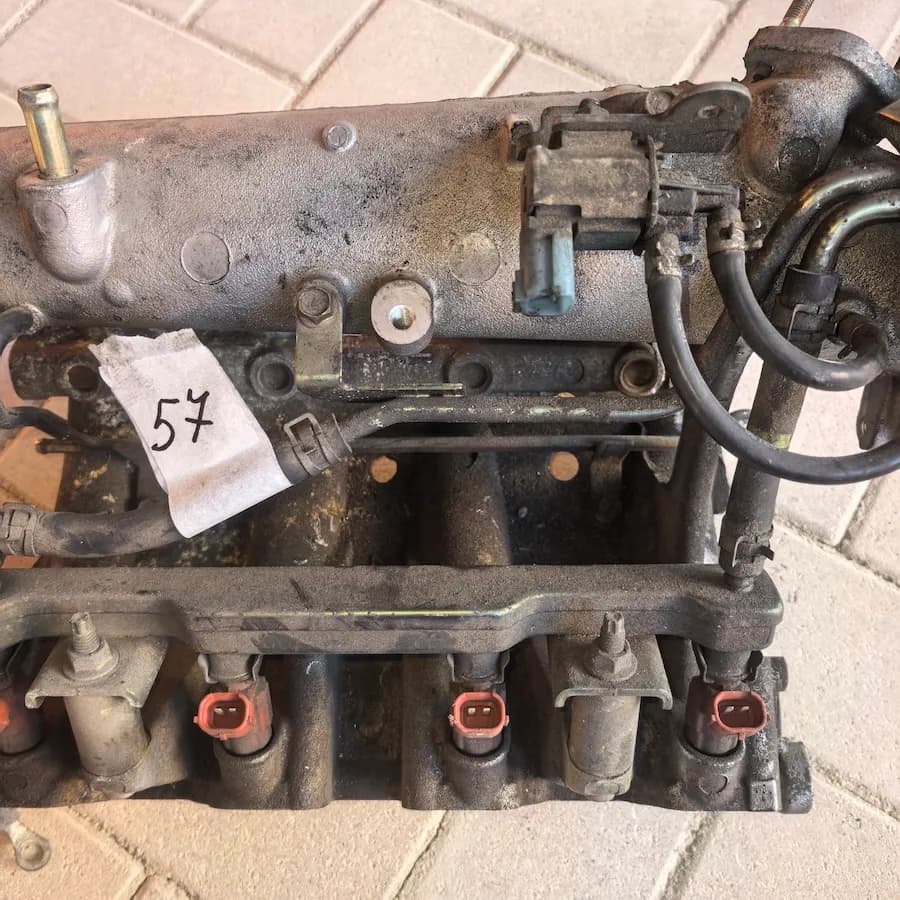 Впускной коллектор в сборе Nissan Sunny, OEM 140014M560 — фото 3