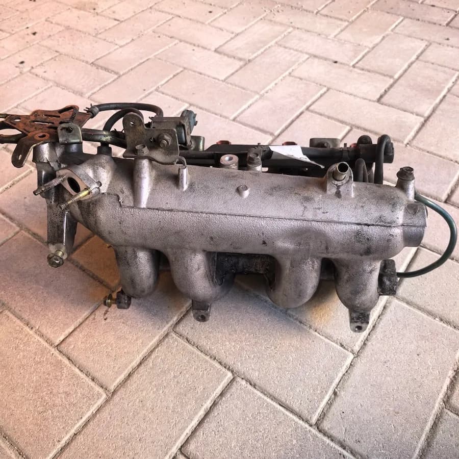 Впускной коллектор в сборе Nissan Sunny, OEM 140014M560 — фото 6