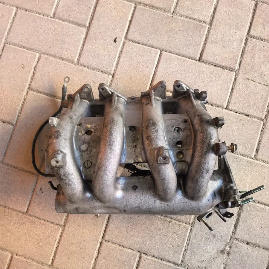 Впускной коллектор в сборе Nissan Sunny, OEM 140014M560 — фото 9